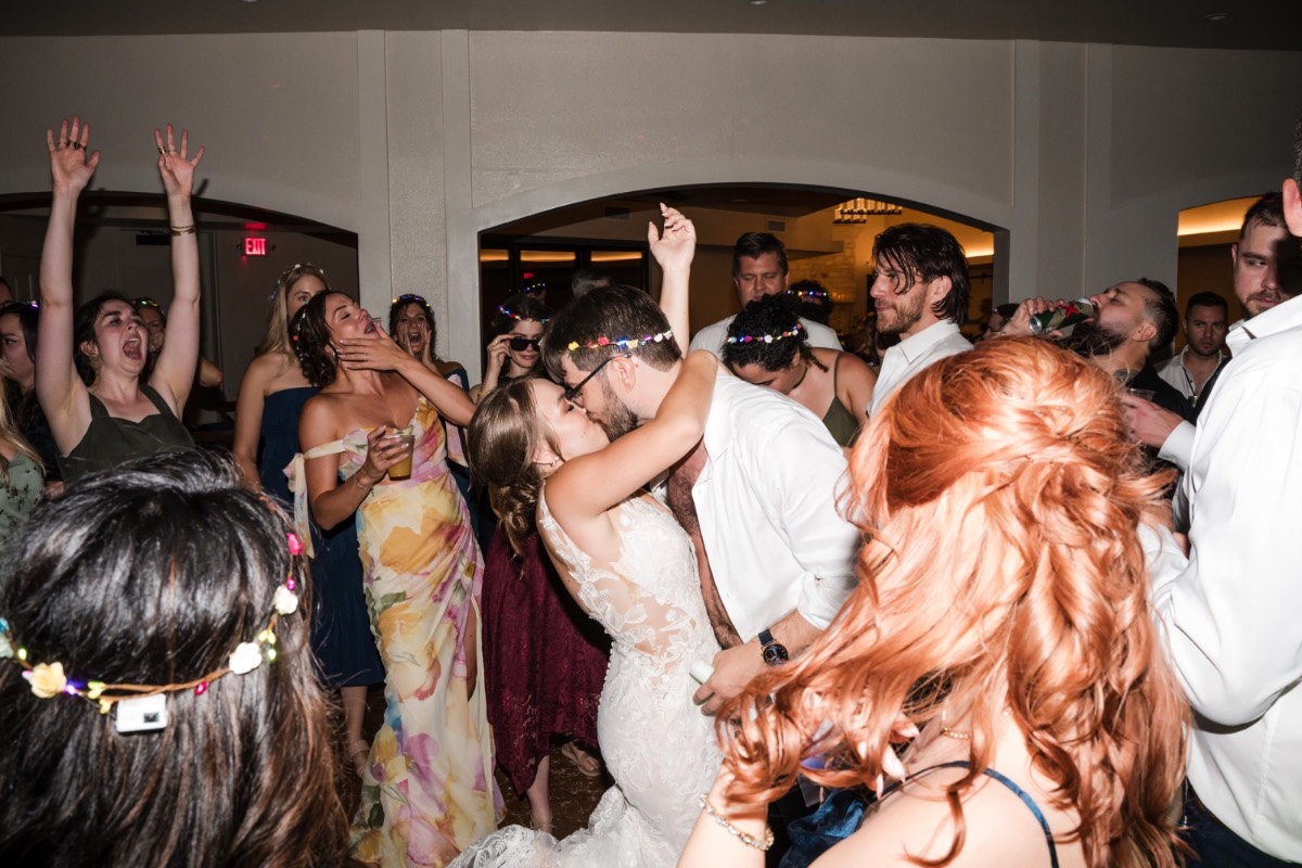 Best man toasting bride and groom at Garey House Georgetown wedding