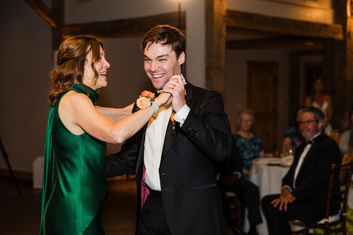 Late night reception dancing with ambient lighting at Camp Lucy venue