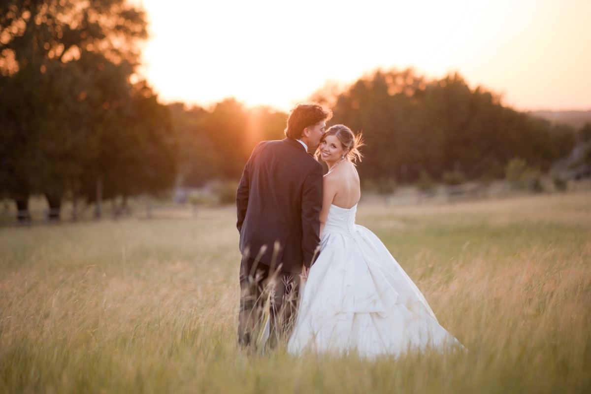Guests toasting newlyweds P and B at Hidden River Ranch venue