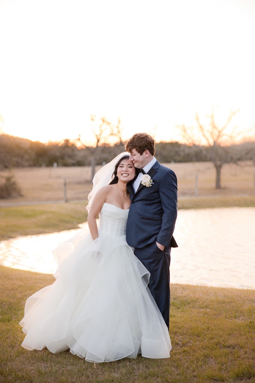 L and M toasting with guests at Pecan Springs Ranch Austin Texas