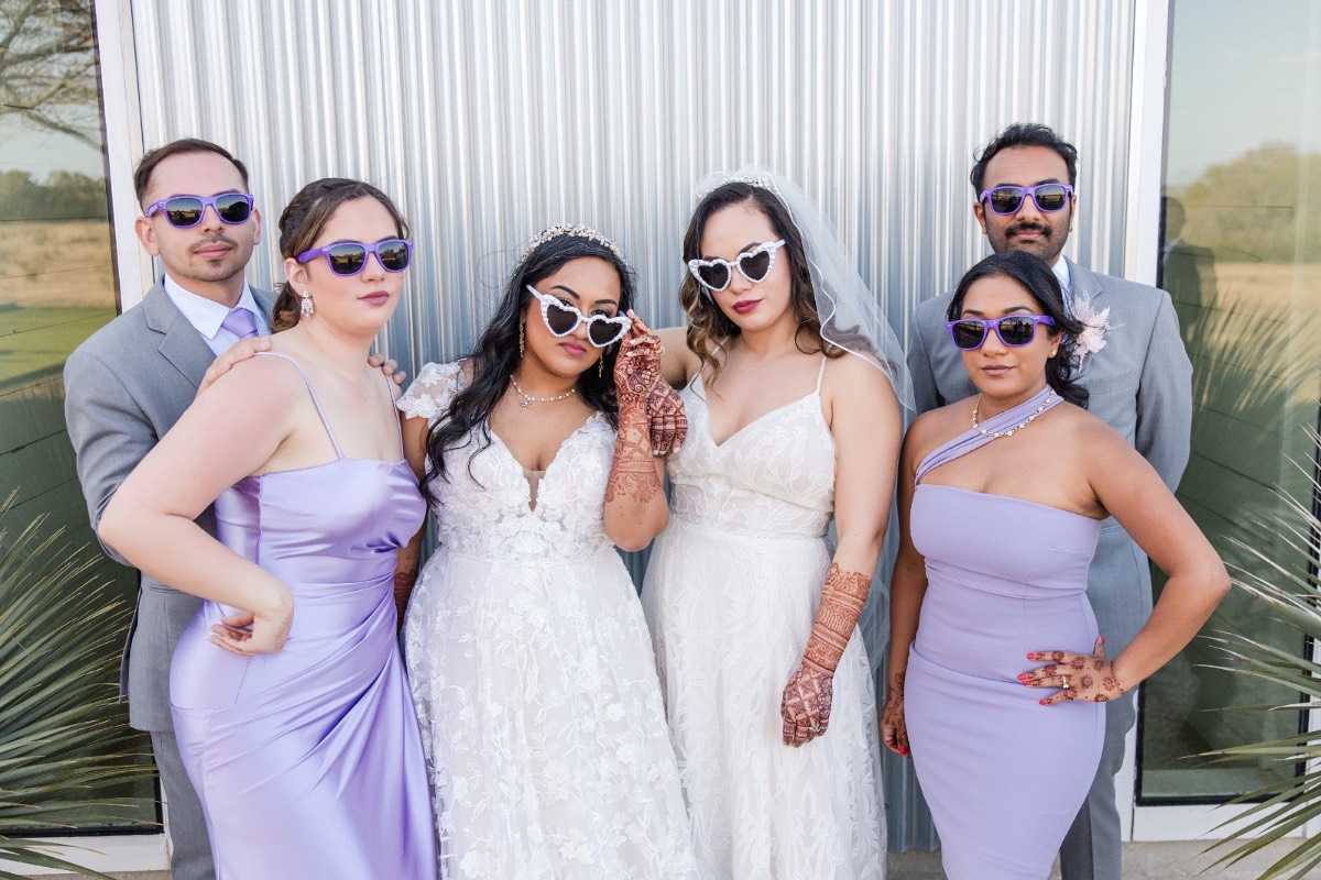 bridal party photos with two brides in Austin tx at their lgbtq wedding