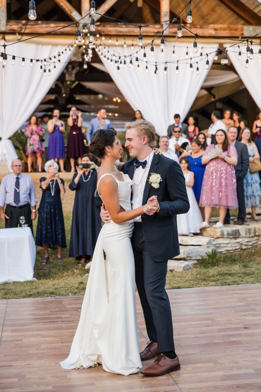 Guests mingling during cocktail reception at Balcones Springs wedding venue