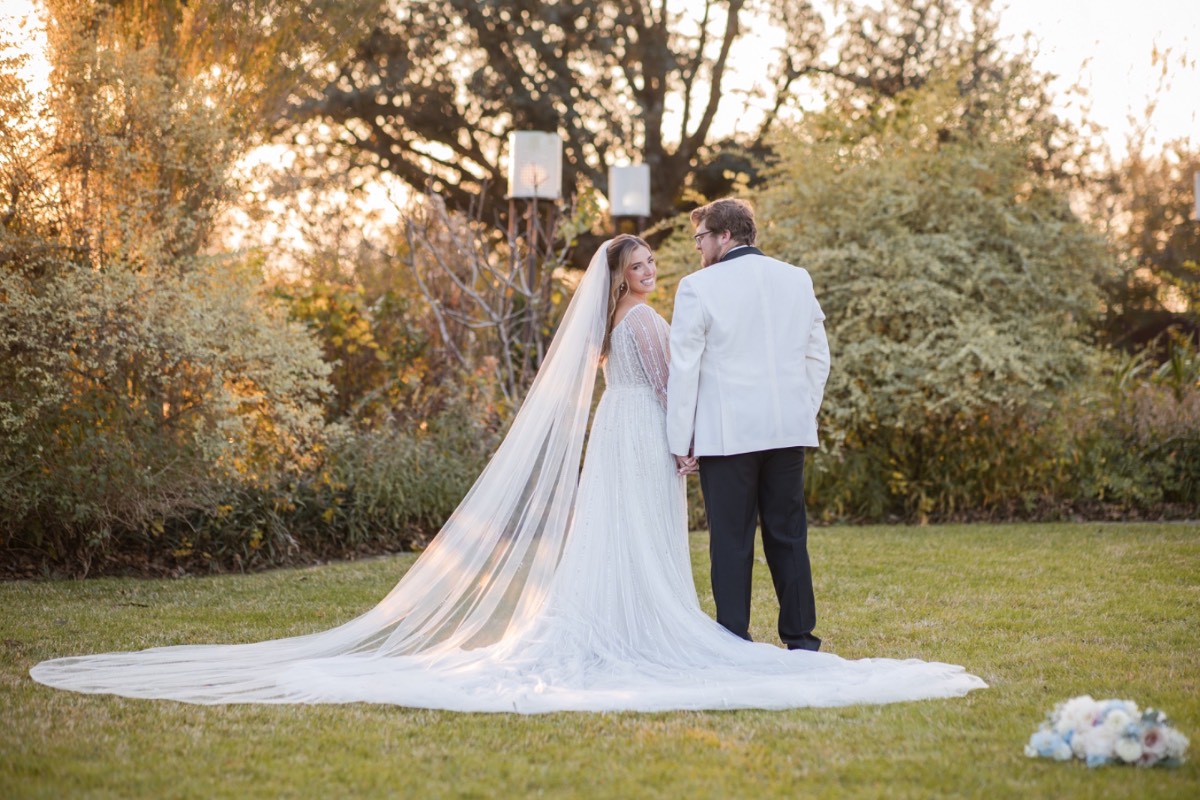 Groom dipping bride during portrait session at Barr Mansion winter wedding.