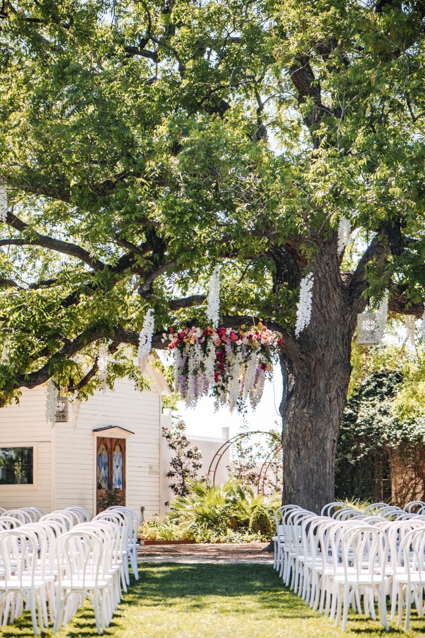 Bride L's father walking her down aisle at Barr Mansion venue