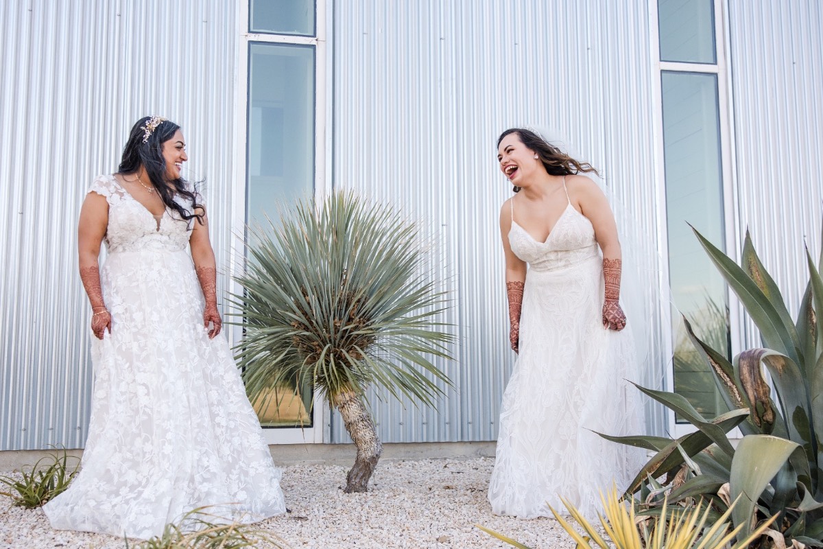 Guests dancing at reception under lights at Prospect House Dripping Springs