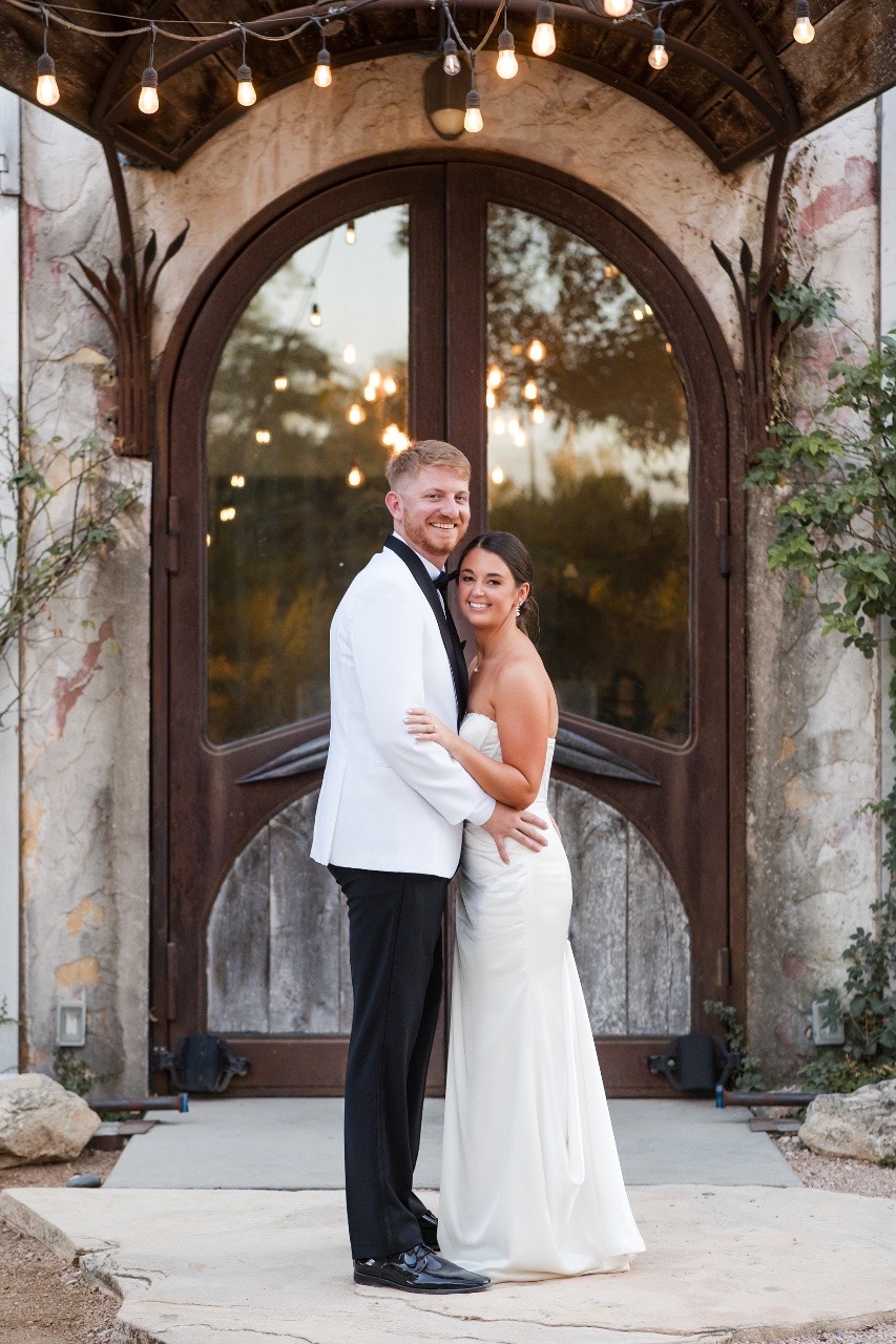 Couple dancing together during portrait session at Barr Mansion Austin venue