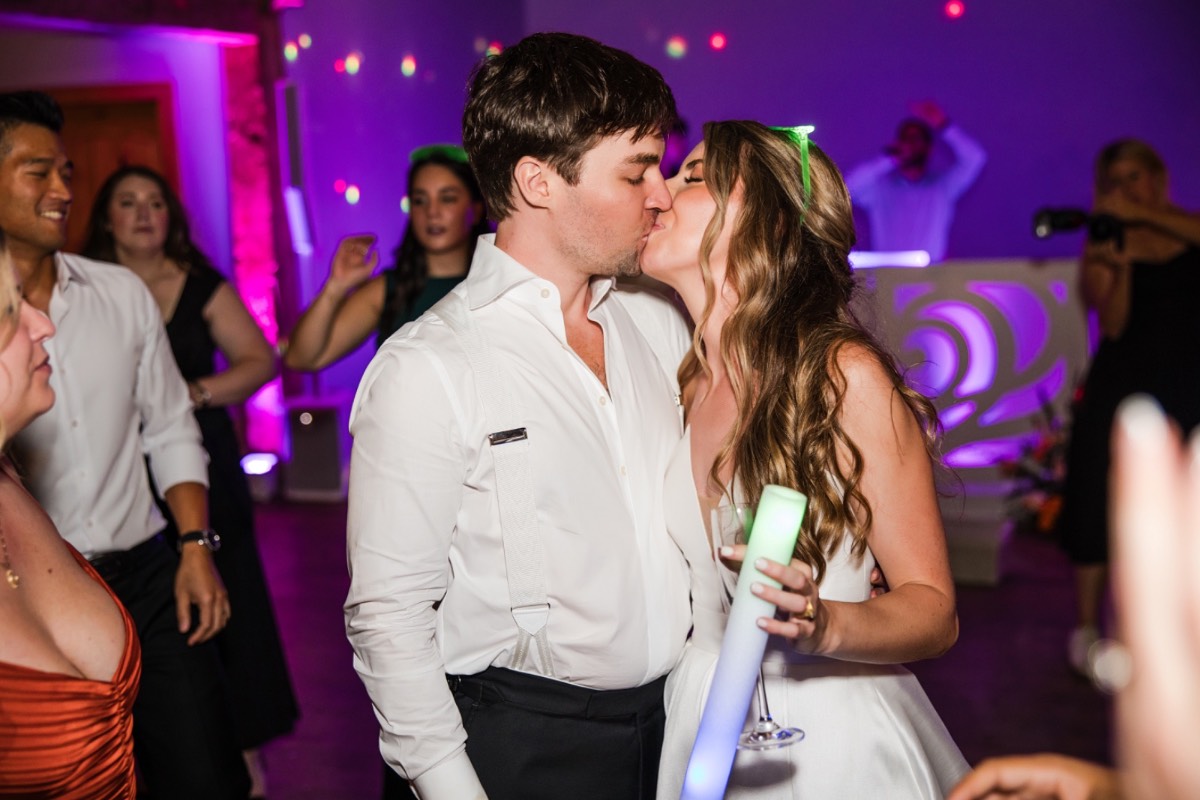 Sparkler exit moment for AJ and C at Camp Lucy wedding