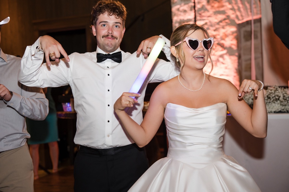 Groom dancing with mother at P and B's Hidden River Ranch wedding