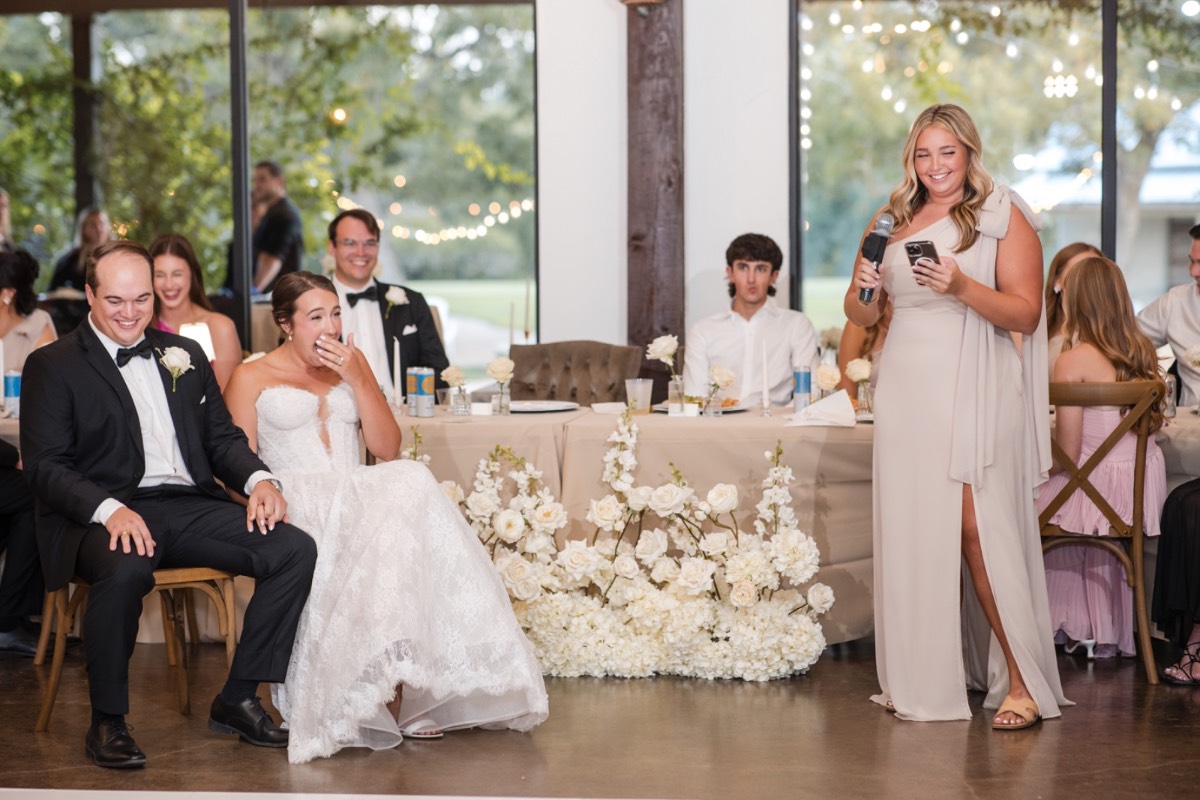 Reception venue decorated for Darby and Will at Pecan Springs Ranch