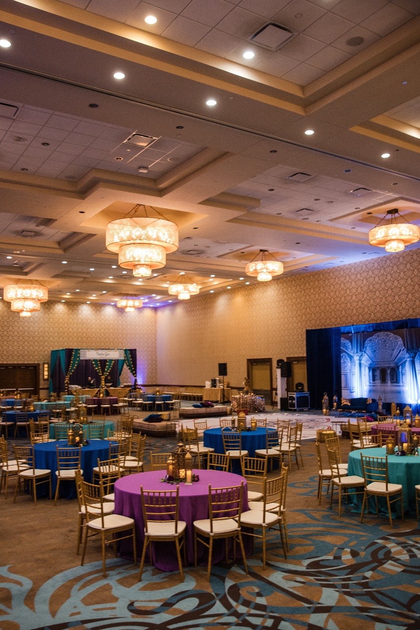 Wedding details including rings and invitation at Hyatt Regency Austin