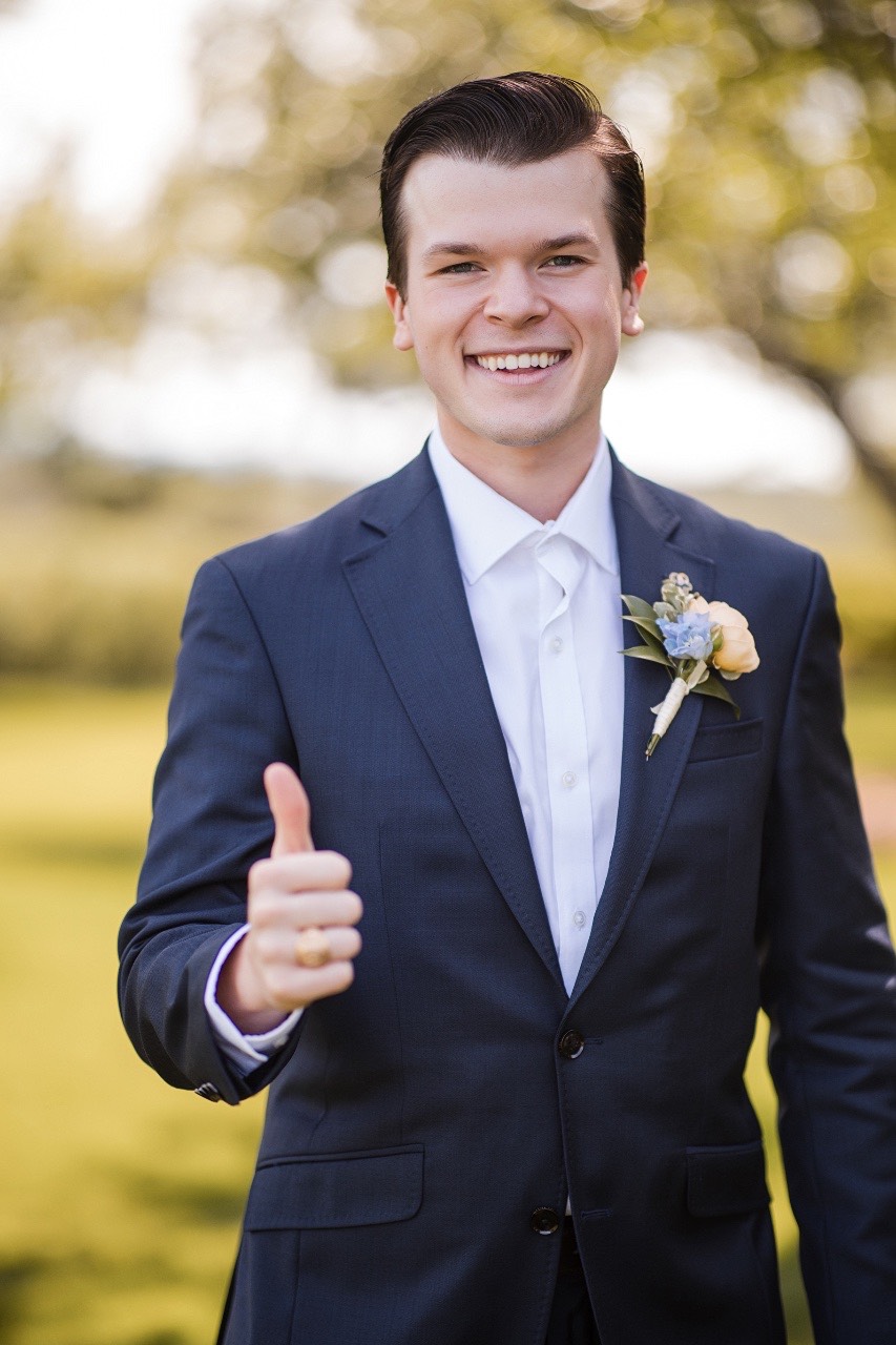 O's bridal portrait with natural Dripping Springs landscape at Canyonwood Ridge venue