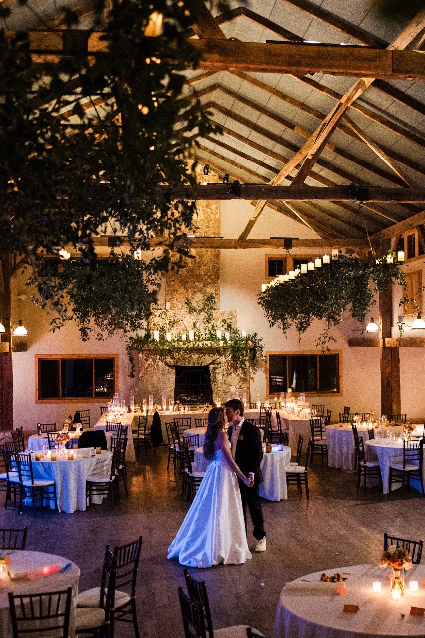 Bride and groom running through sparklers at Camp Lucy Dripping Springs Texas