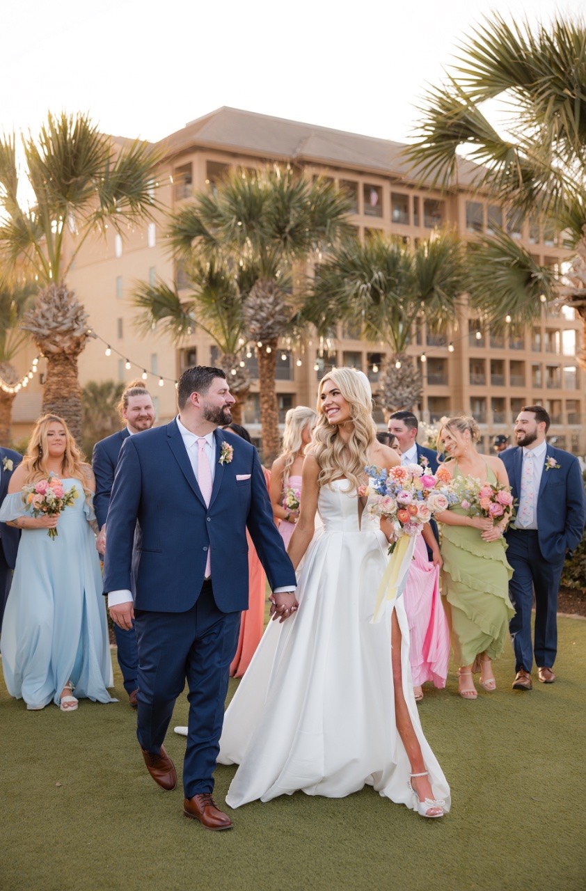 Groomsmen celebrate with groom S at Horseshoe Bay Resort reception