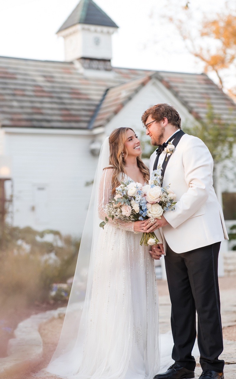 A gazing at S during romantic portrait session at Barr Mansion Austin.