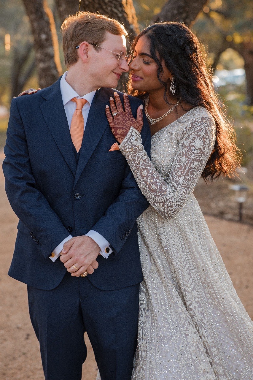 Bride and groom cocktail hour moment at Two Streams One Heart Ranch