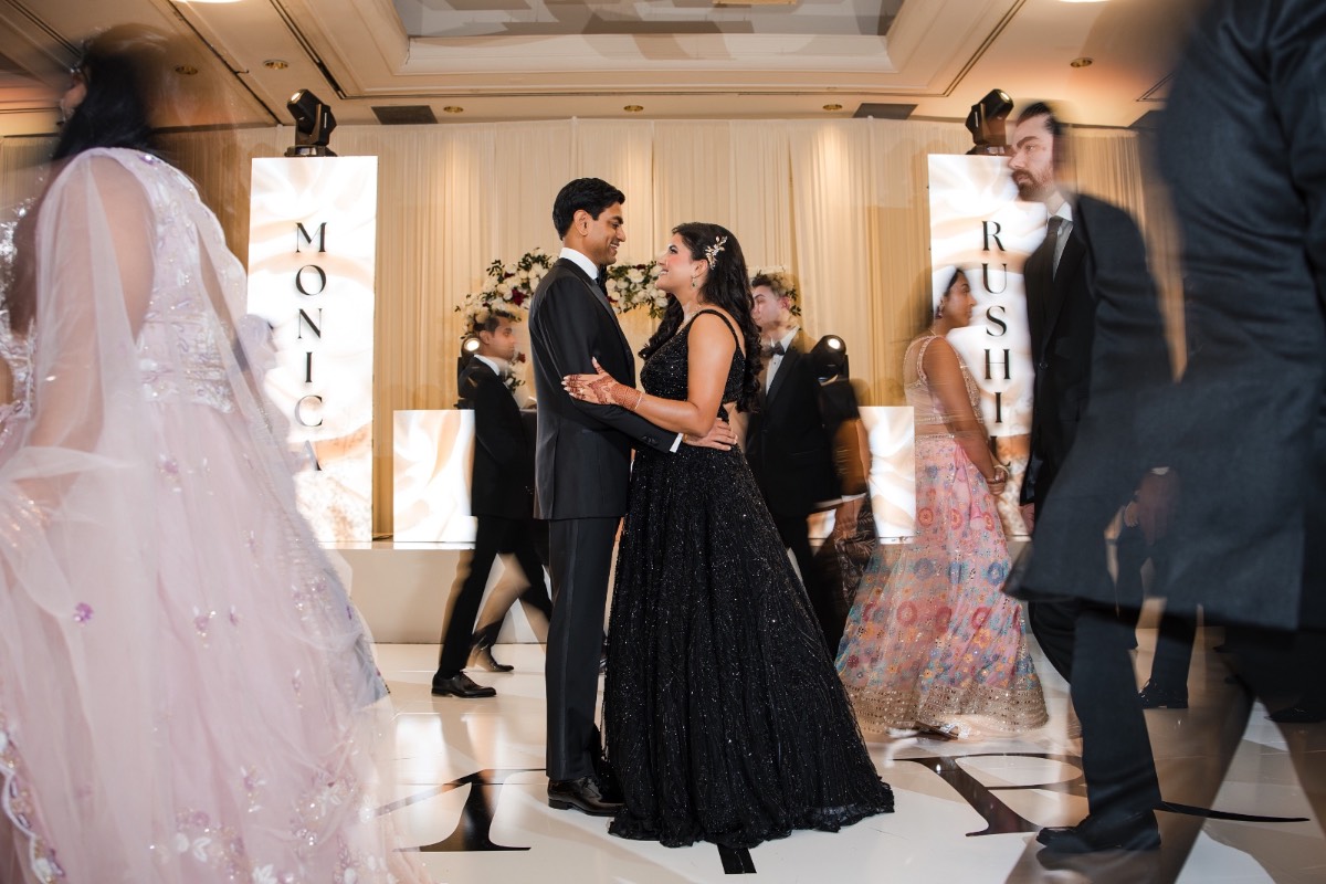 Bride R and groom M's first dance at Renaissance Austin Hotel wedding reception