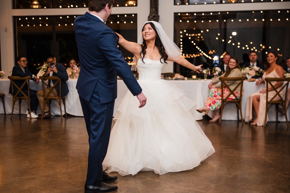 L dancing with her father at Pecan Springs Ranch wedding reception
