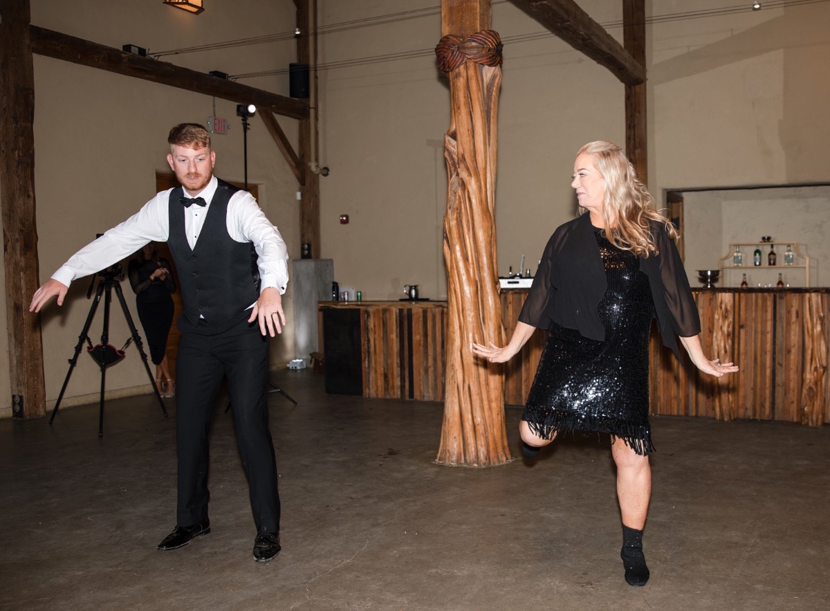 Live band or DJ performing during cocktail hour at fall Barr Mansion wedding