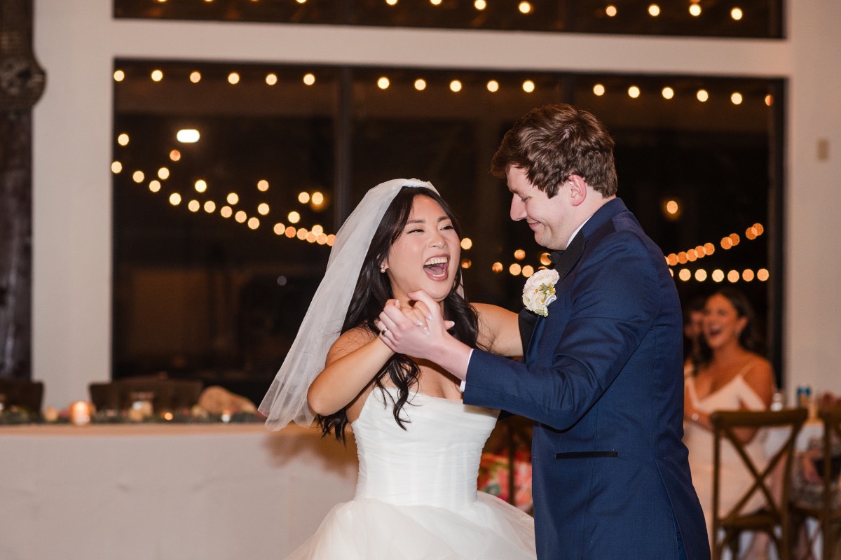 Groom M dancing with his mother at Pecan Springs Ranch wedding