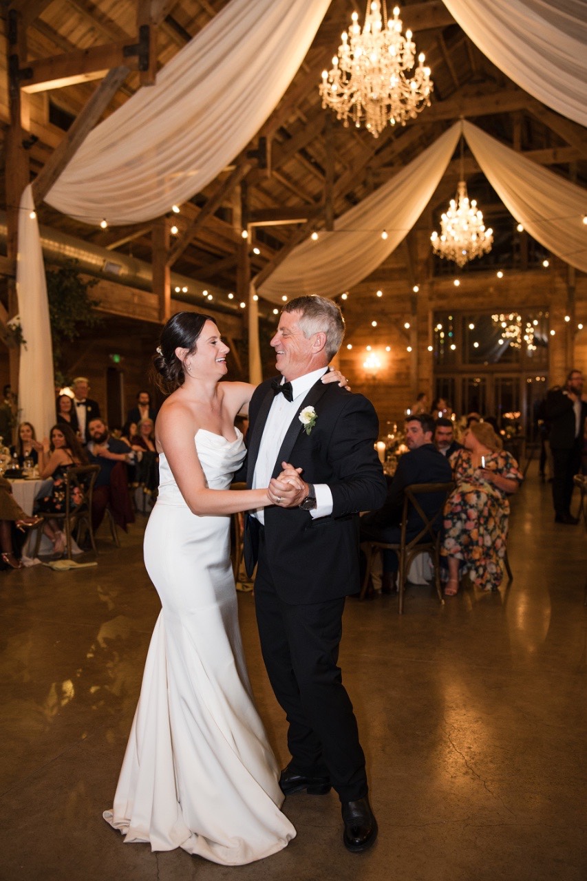 Emotional speech moment during K and J's reception at The Addison Grove