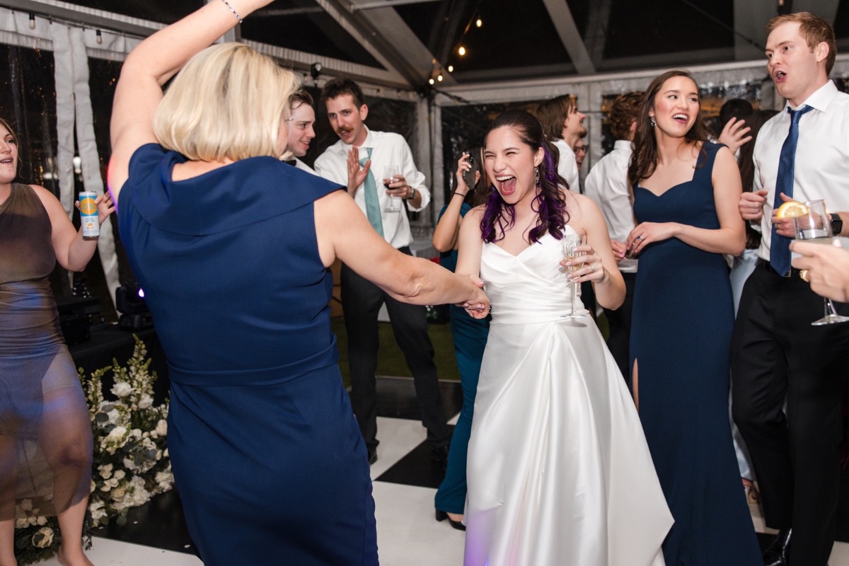 Bride dancing with father at Woodbine Mansion Round Rock wedding