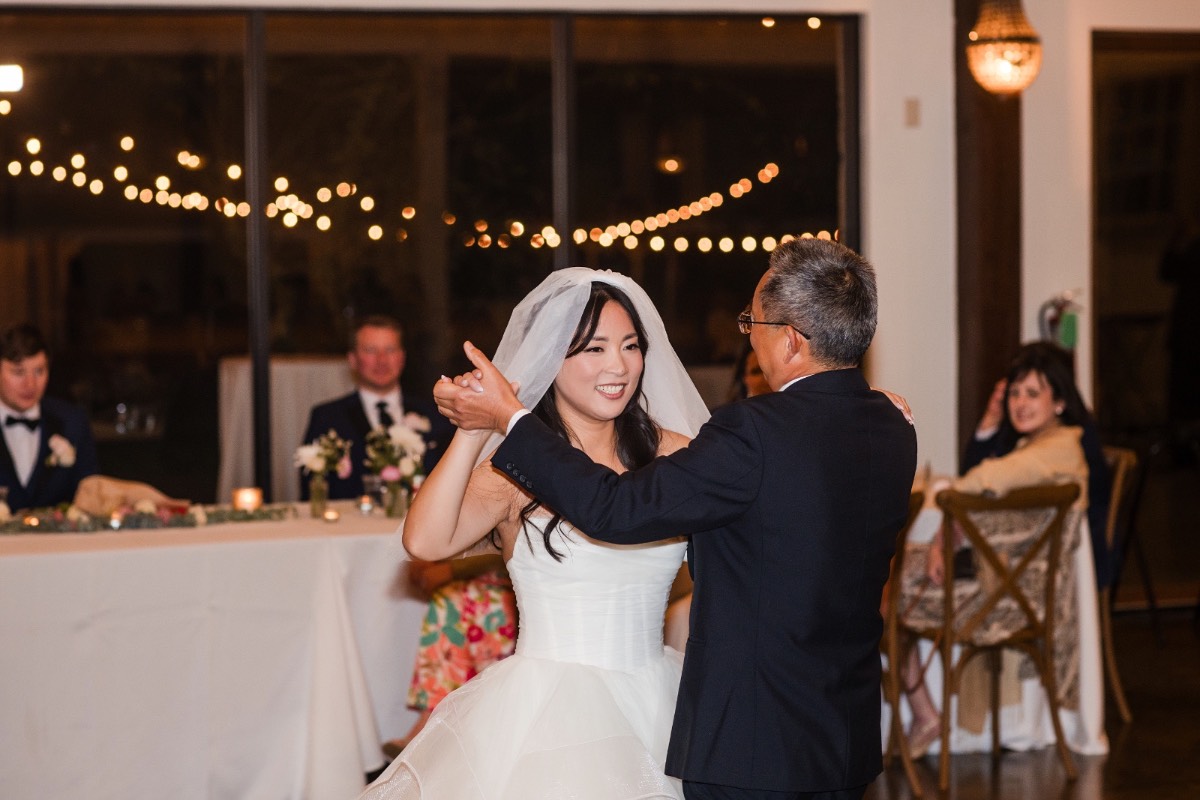 Maid of honor giving toast to bride L at Pecan Springs Ranch