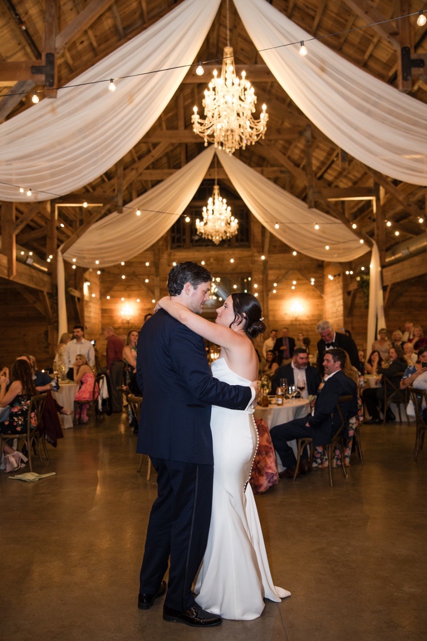 Bride K and groom J cutting their cake at The Addison Grove Texas