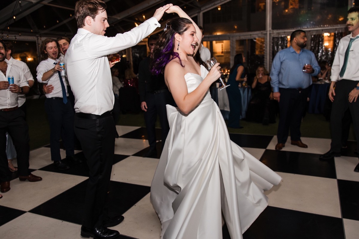 Bride and groom sharing cake at Woodbine Mansion wedding