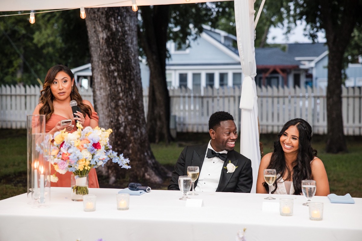 Groom H celebrating with wedding party at Round Rock venue