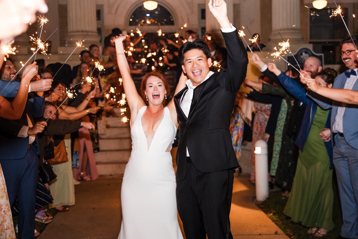Bride and groom toasts at Hotel Ella wedding reception