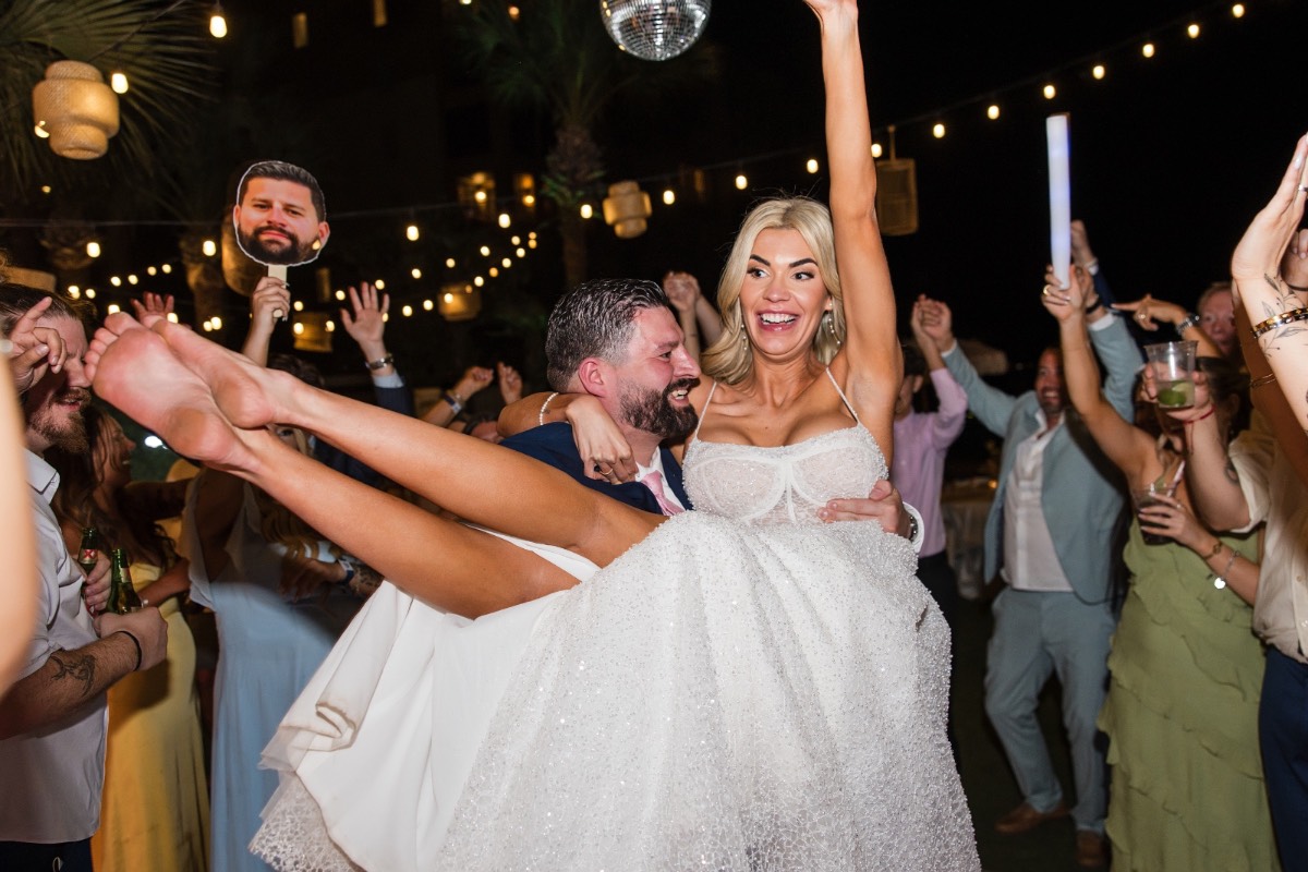 Guests celebrate S and A at Horseshoe Bay Resort reception dinner