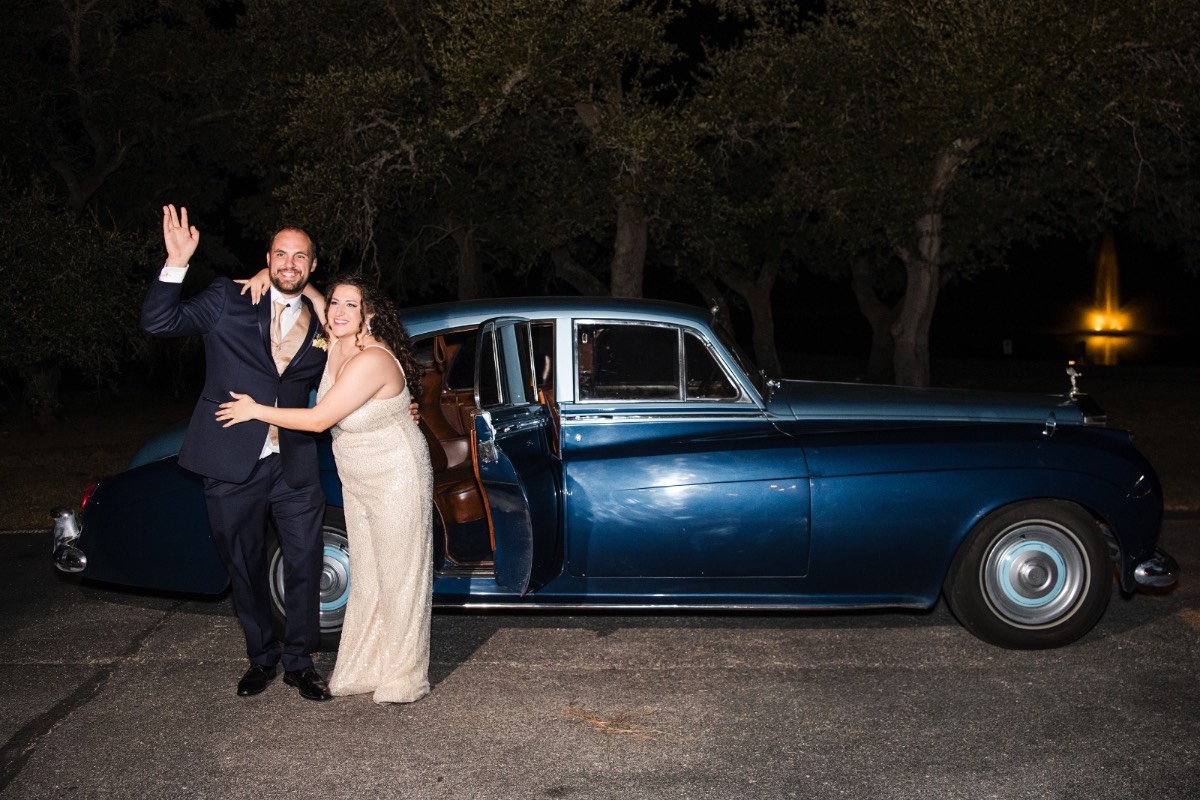 Guests laughing and clapping during toasts at Ma Maison fall wedding