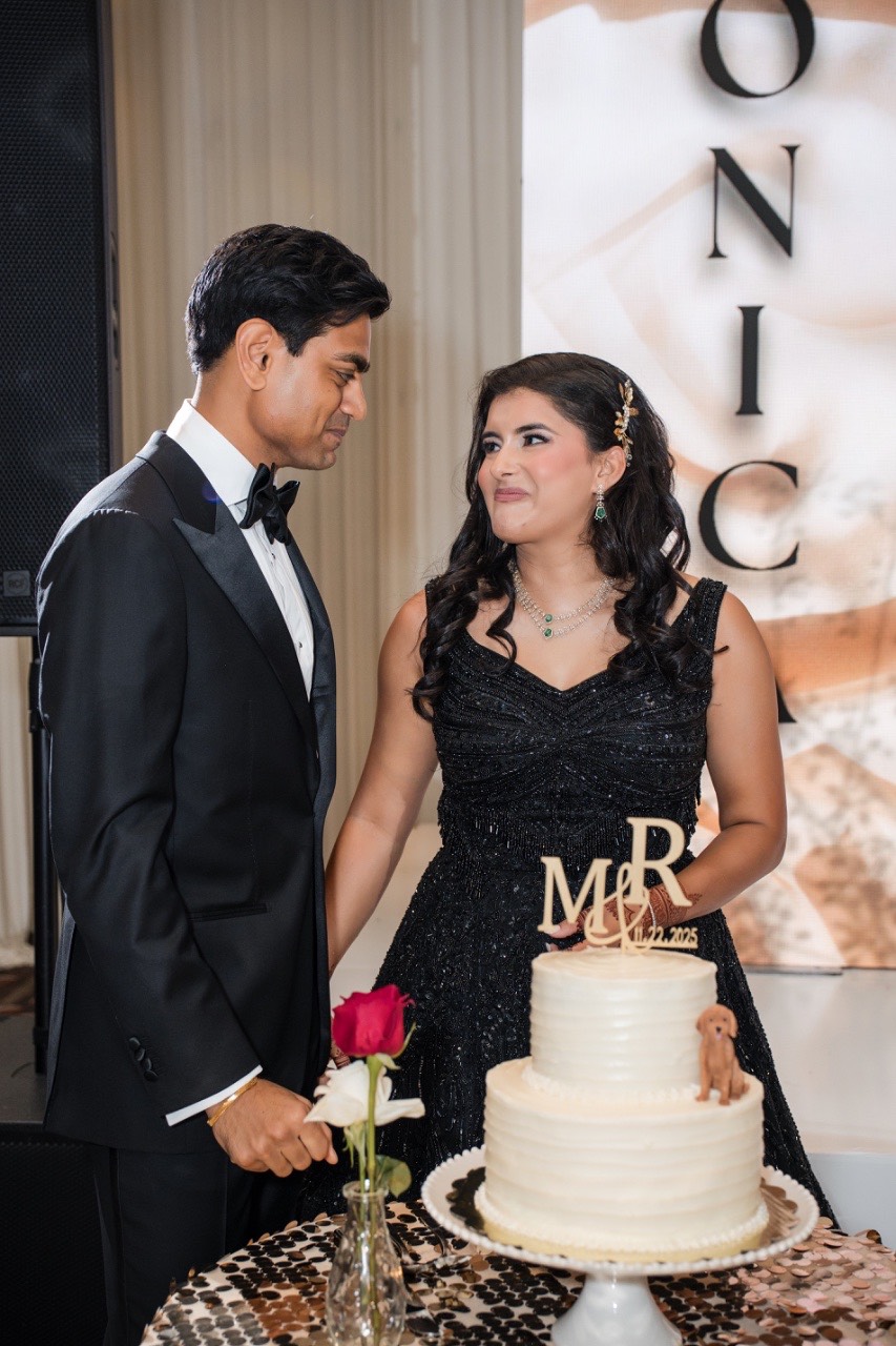 Cake cutting moment for M and R at Renaissance Hotel Austin wedding