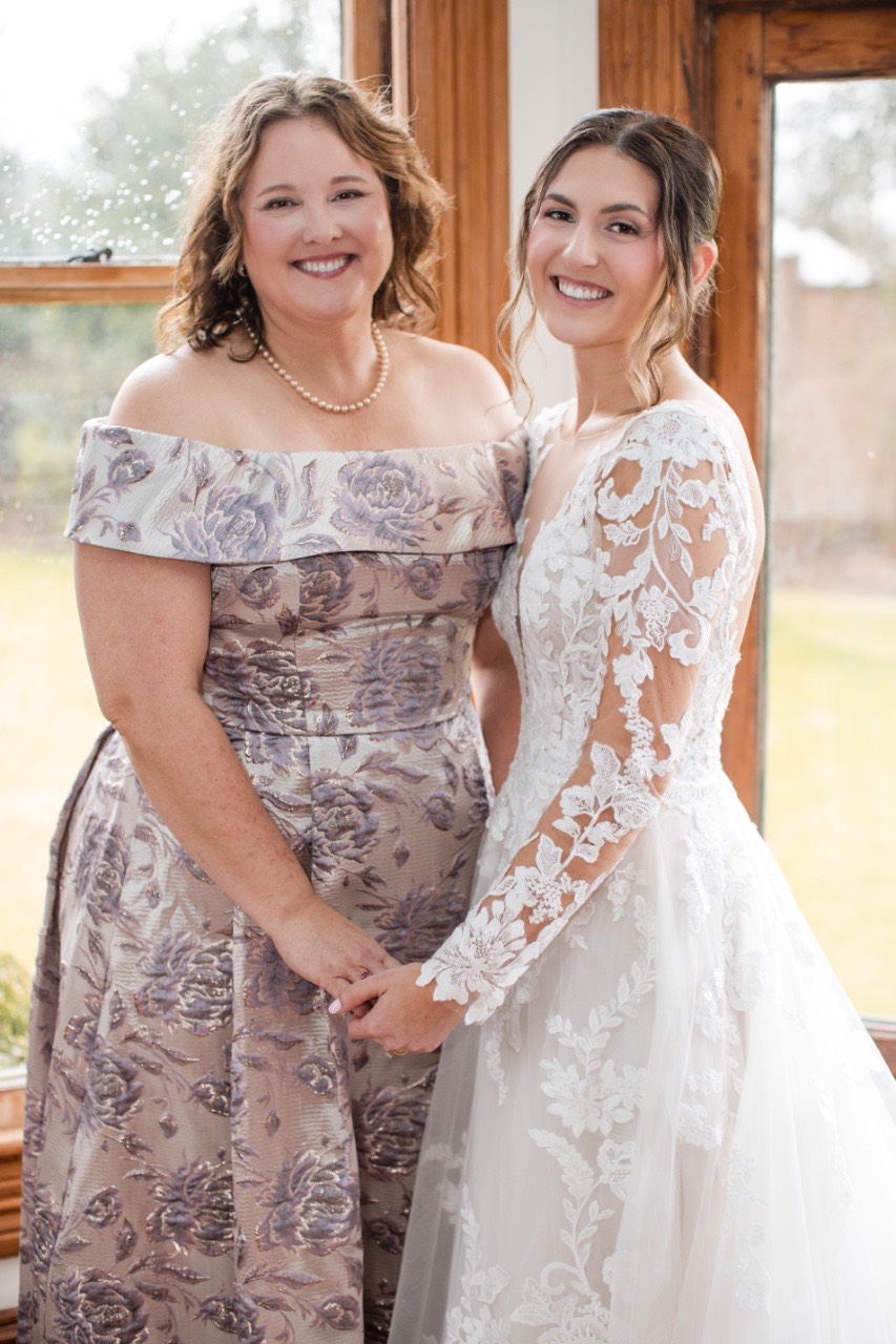 Bridal party portraits under cover at rainy Barr Mansion.