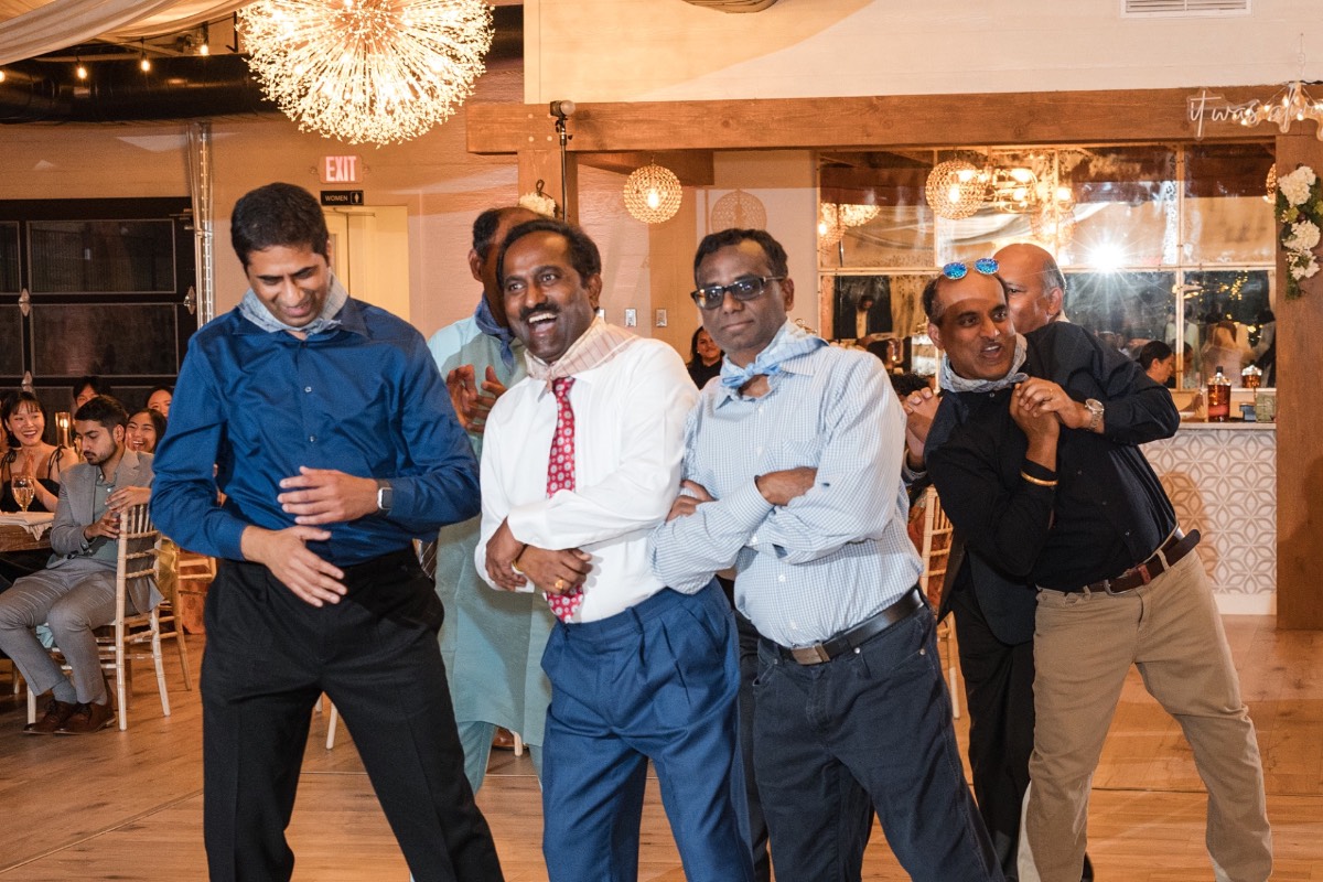 Wedding reception guests at Two Hearts One Stream at Spicewood location