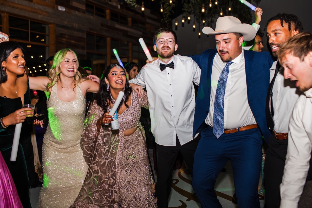 Bride and groom with sparklers during wedding exit at Dripping Springs