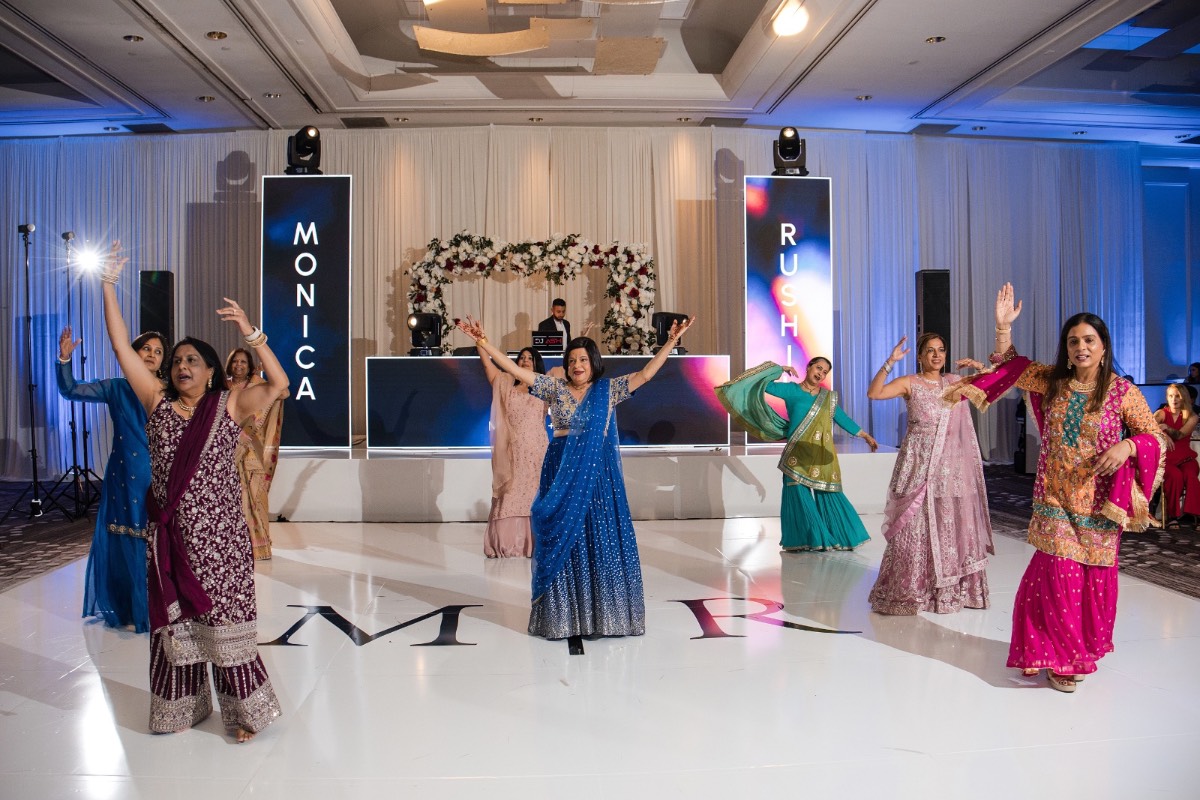 Guests enjoying dinner and dancing at Renaissance Hotel Austin wedding reception