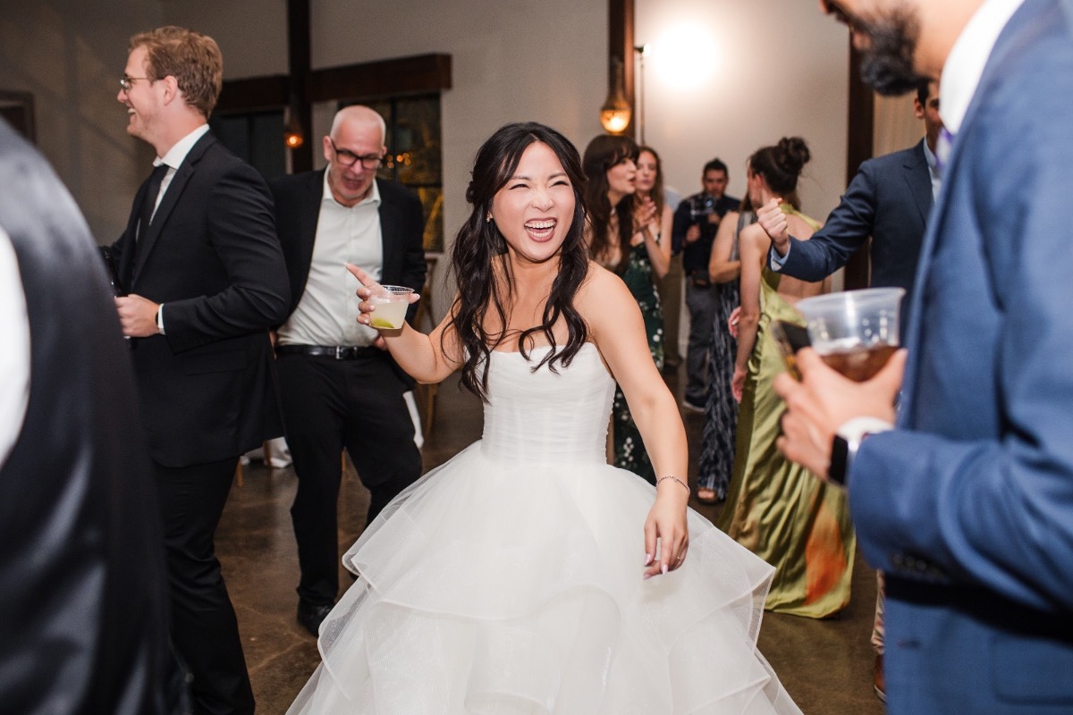 L and M's last dance before exit at Pecan Springs Ranch wedding