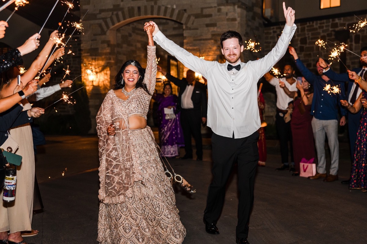 Newlyweds' grand exit during Canyonwood Ridge Indian wedding celebration