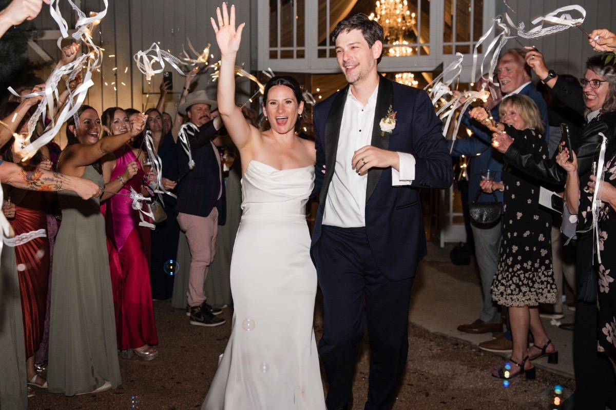Groom J celebrating with friends at The Addison Grove wedding reception Austin
