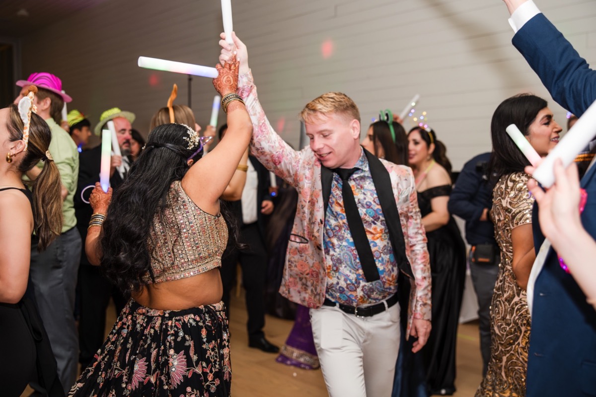 Bride A hugs loved ones goodbye at Prospect House Dripping Springs wedding