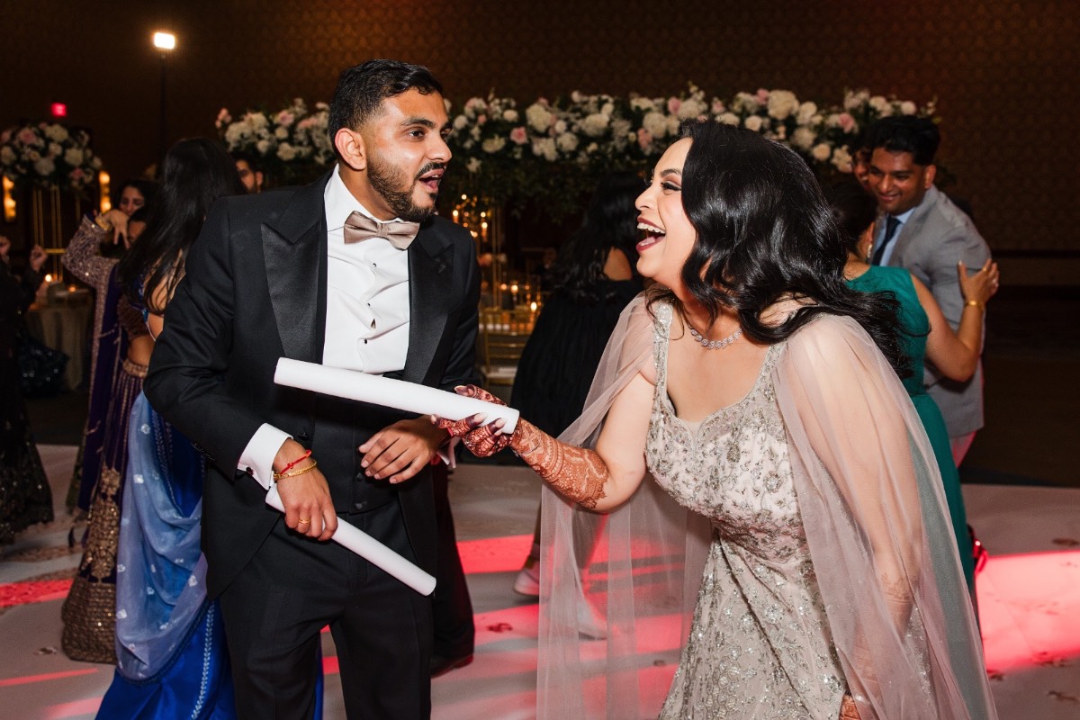 Groom S enjoying reception dancefloor at Hyatt Regency Austin