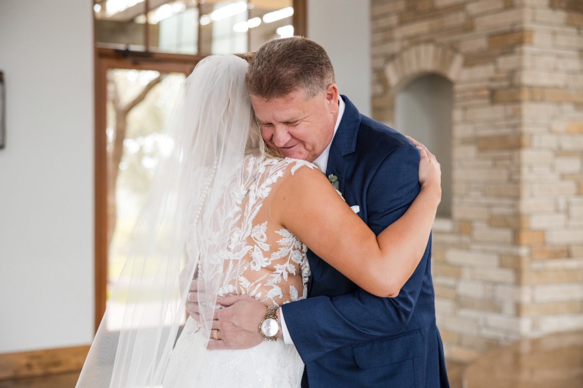 Bride's bouquet and accessories arranged at Canyonwood Ridge outdoor winter wedding