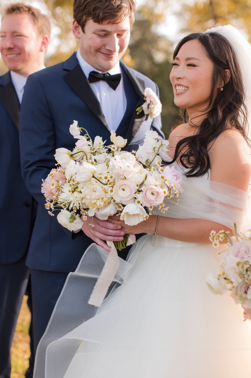 M's expression during first look with bride at Pecan Springs Ranch Austin