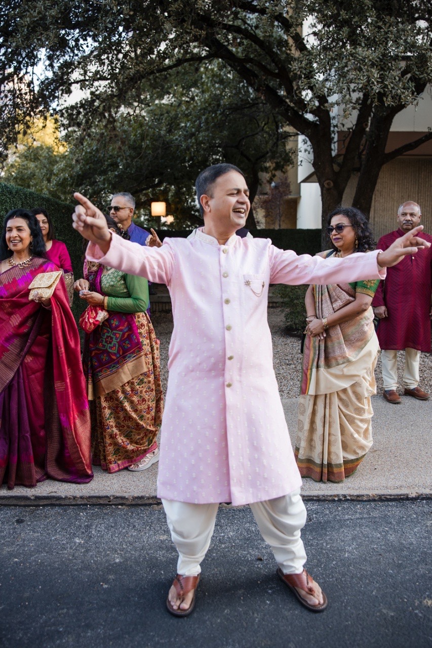 Fun candid moments on dancefloor at Hyatt Regency Austin reception