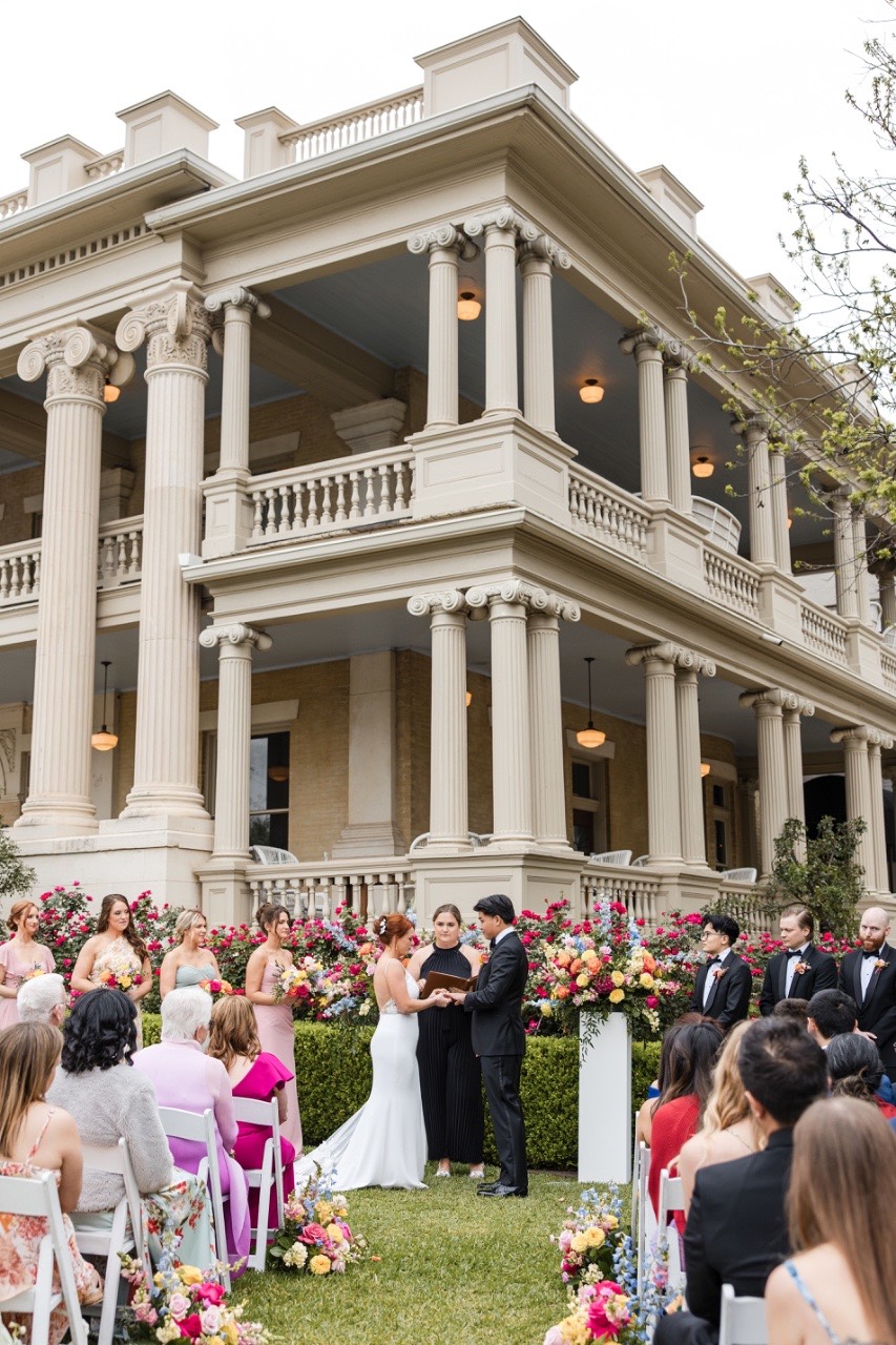 Bouquet toss moment at Hotel Ella wedding reception
