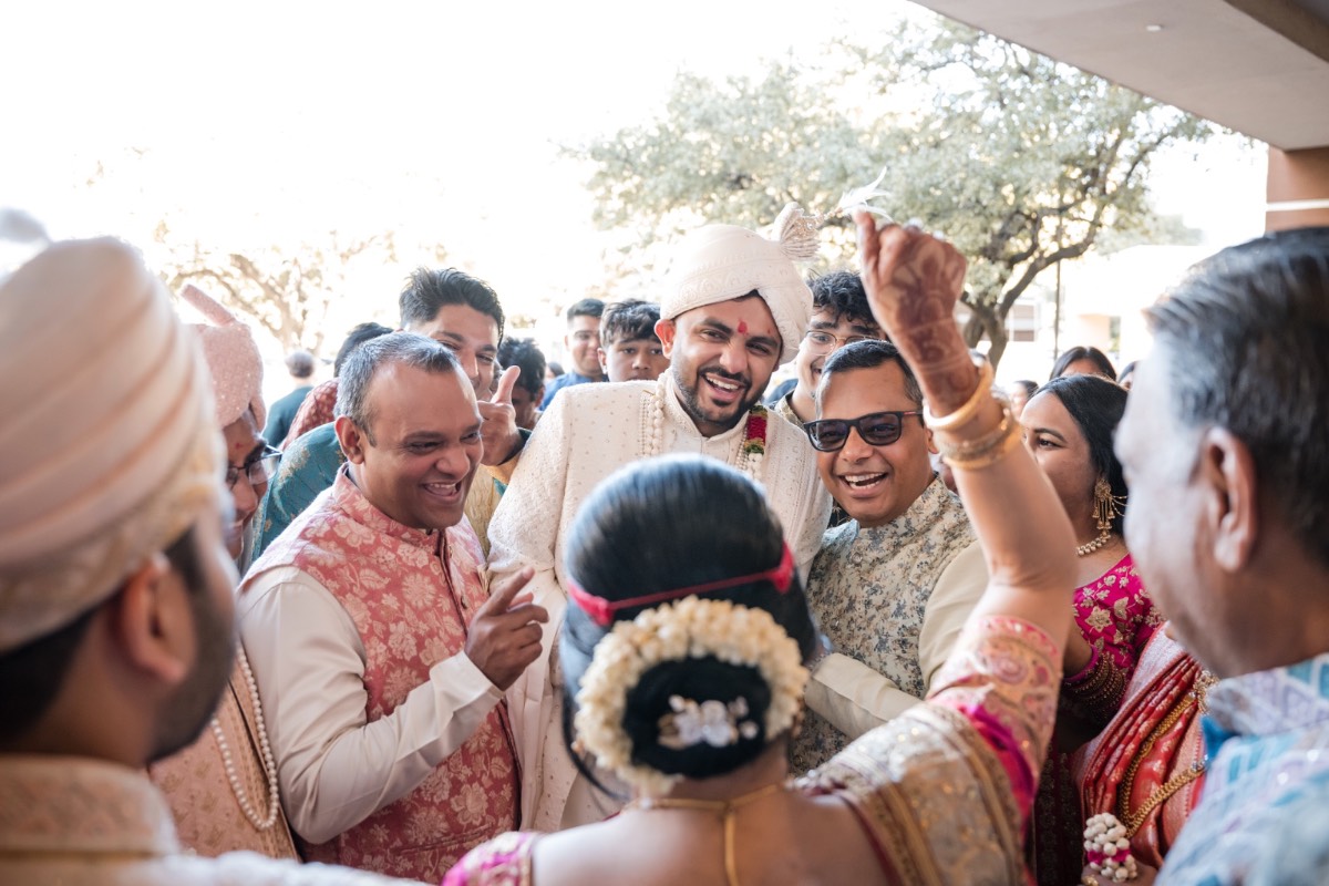 Bride and groom dancing under lights at Hyatt Regency Austin