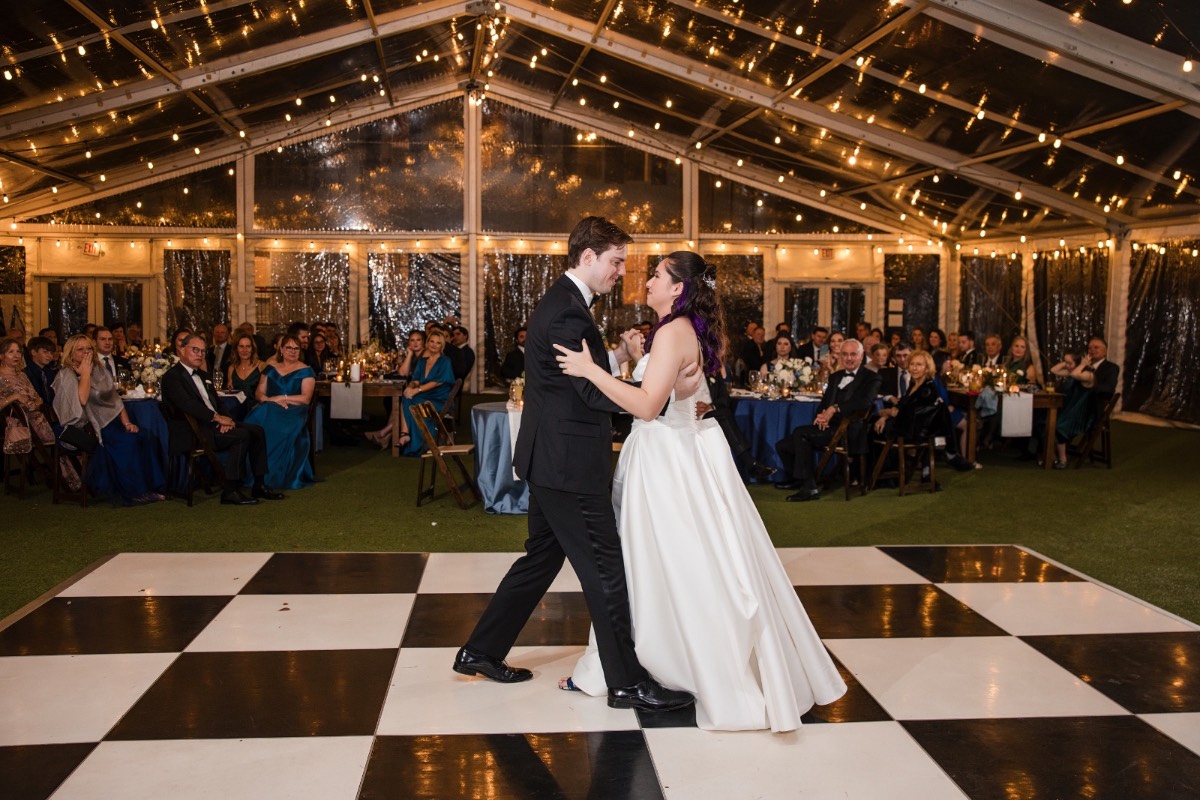 Evening shot of illuminated Woodbine Mansion after wedding celebration
