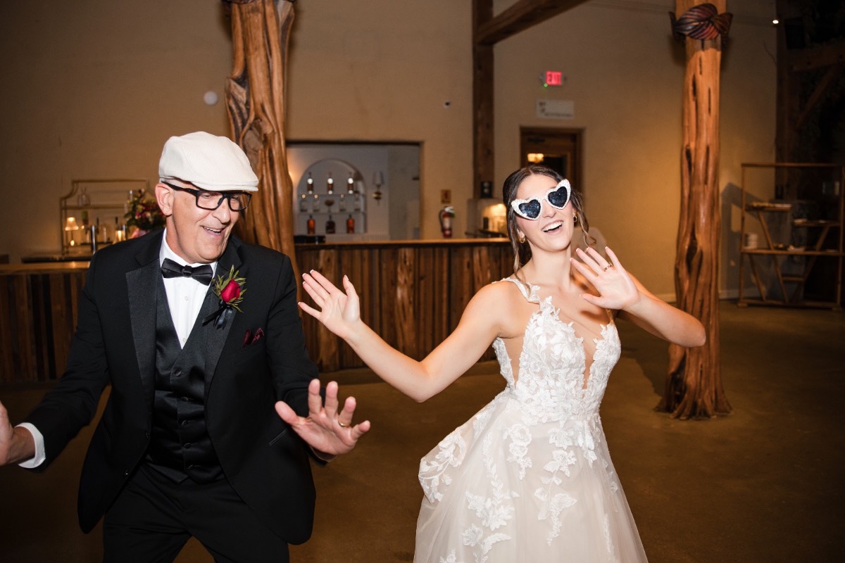 S and M's send-off from rainy Barr Mansion Austin.