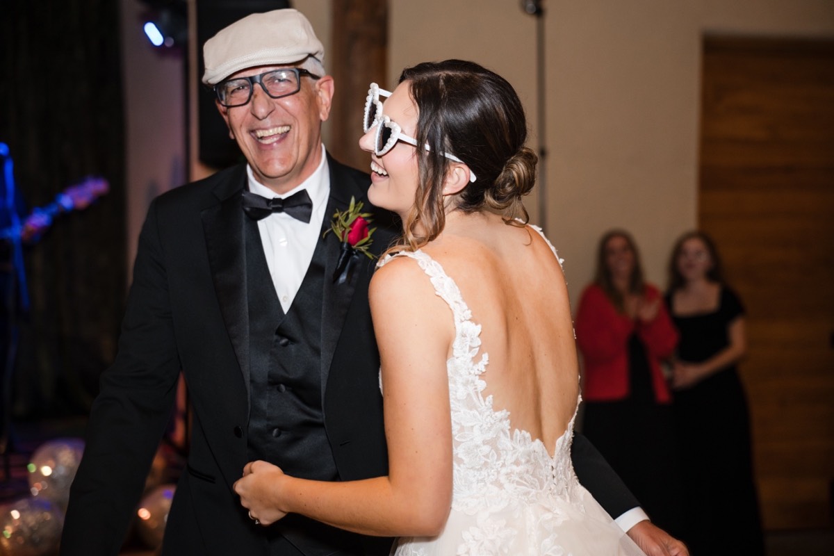 Sparkler exit during rainy wedding night at Barr Mansion venue
